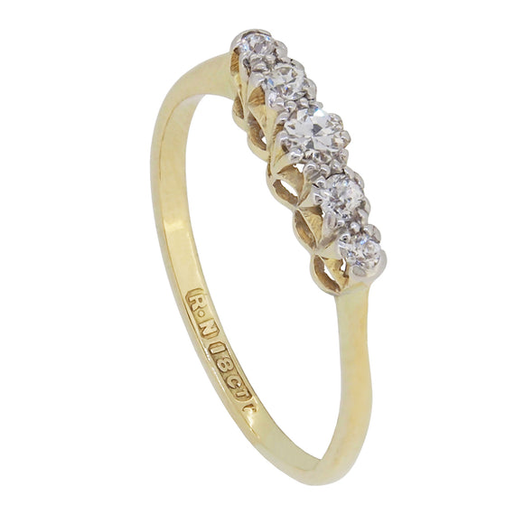 A mid-20th century, 18ct yellow gold, diamond set, five stone half hoop ring