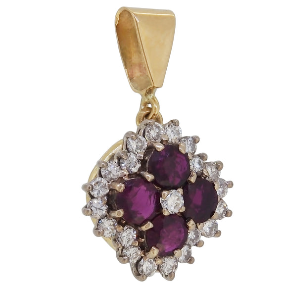 A modern, 9ct yellow gold, ruby & diamond set cluster pendant