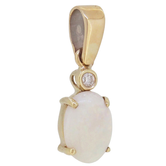 A modern, 9ct yellow gold, opal & diamond set pendant