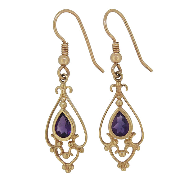 A pair of modern, 9ct yellow gold, amethyst set drop earrings