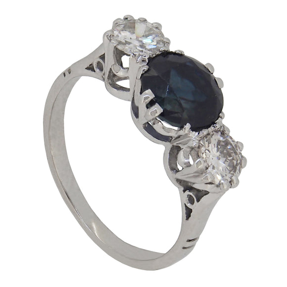 An early 20th century, platinum, sapphire & diamond set three stone ring