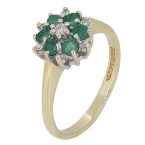 A modern, 9ct yellow gold, emerald &amp; diamond set cluster ring