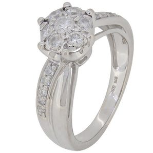 A modern, 9ct white gold, diamond set cluster ring with diamond shoulders.
