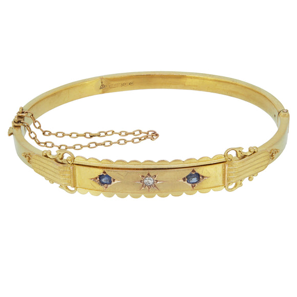 A Victorian, 15ct yellow gold, sapphire & diamond set hinged bangle