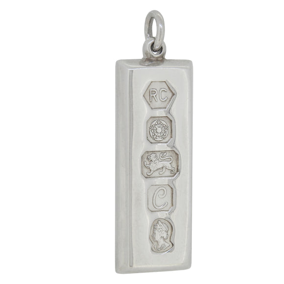 A modern, silver, ingot tag pendant