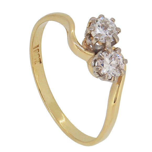 A mid-20th century, 18ct yellow gold, diamond set, two stone crossover ring