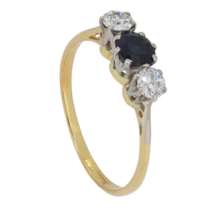 An early 20th century, 18ct yellow gold, sapphire & diamond set three stone ring