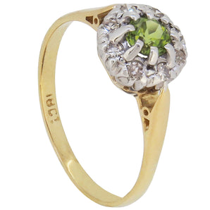 An early 20th century, 18ct yellow gold, peridot & diamond set cluster ring