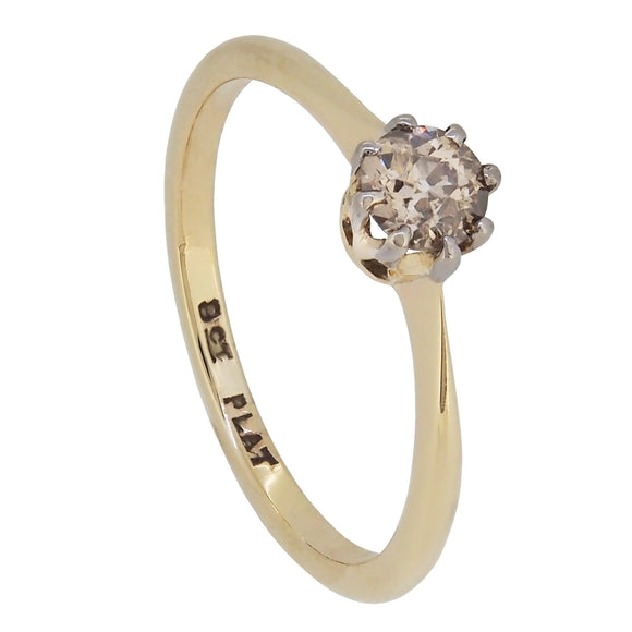 An early 20th century, 9ct yellow gold & platinum setting, old cut diamond set single stone ring