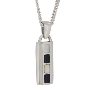 A modern, silver, black & white mother of pearl set pendant & chain