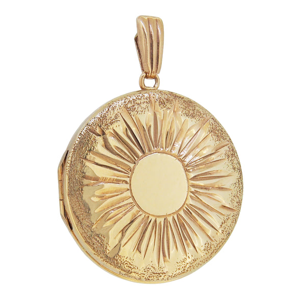 A modern, 9ct yellow gold, circular locket with an engraved pattern