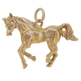 A mid-20th century, 9ct yellow gold horse pendant.