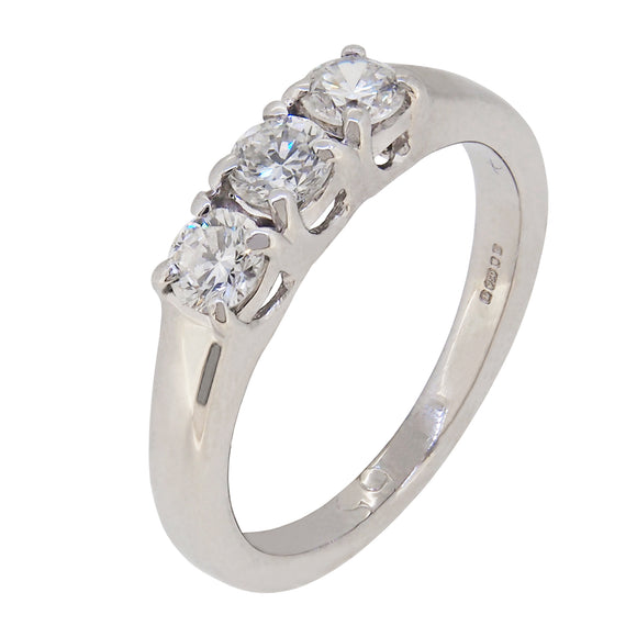 A modern, 18ct white gold, diamond set trilogy ring