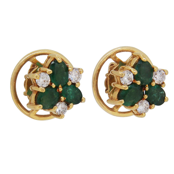 A pair of modern, 18ct yellow gold, emerald & diamond set stud earrings.