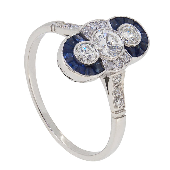 A mid-20th century, platinum, sapphire & diamond set, Art Deco, oval, up finger ring.