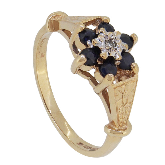 A modern, 9ct yellow gold, sapphire & diamond set, seven stone cluster ring