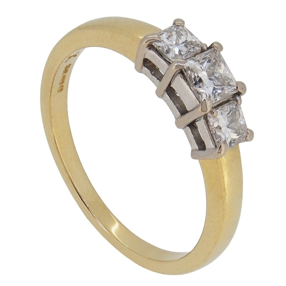 A modern, 18ct yellow gold, princess cut diamond set, three stone ring