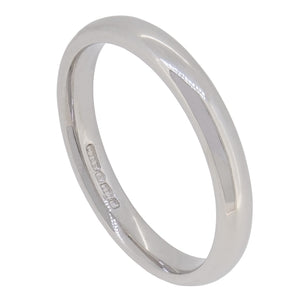 A modern, platinum, Court wedding ring