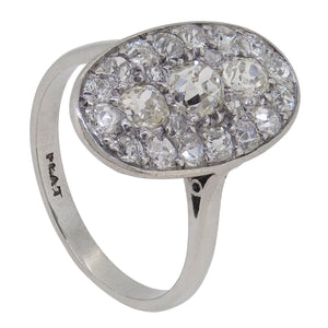 An early 20th century, platinum, Art Deco, diamond set cluster ring.