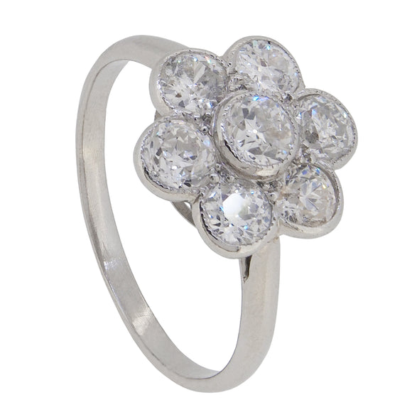 A mid-20th century, platinum, diamond set, daisy style cluster ring