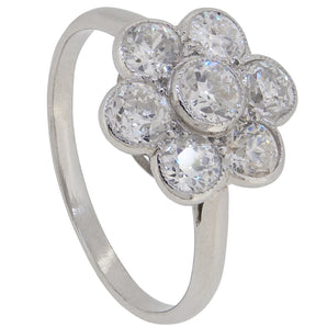 A mid-20th century, platinum, diamond set, daisy cluster ring.