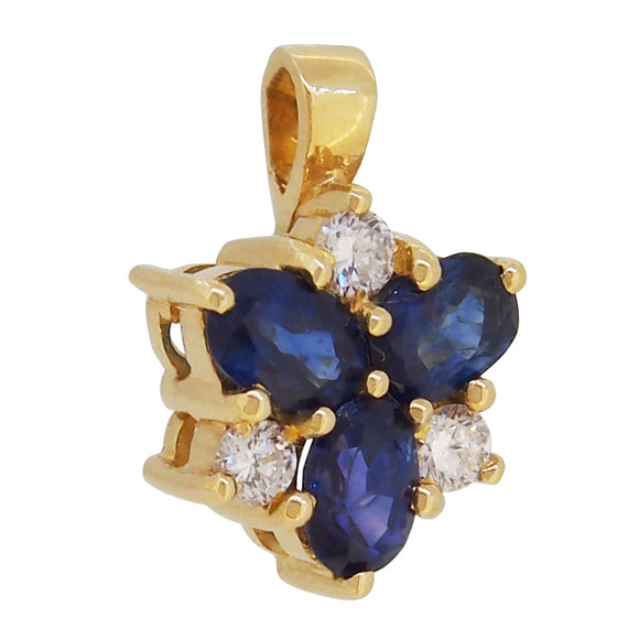 A modern, 18ct yellow gold, sapphire & diamond set pendant