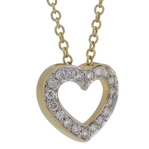 A modern, 18ct yellow gold, diamond set, nineteen stone, open work heart shaped locket & chain.