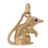 A mid-20th century, 9ct yellow gold, ruby set, mouse charm pendant