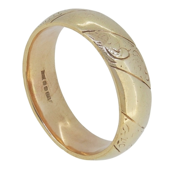 A modern, 9ct yellow gold, court wedding ring.