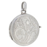 A modern, silver, abalone set circular locket