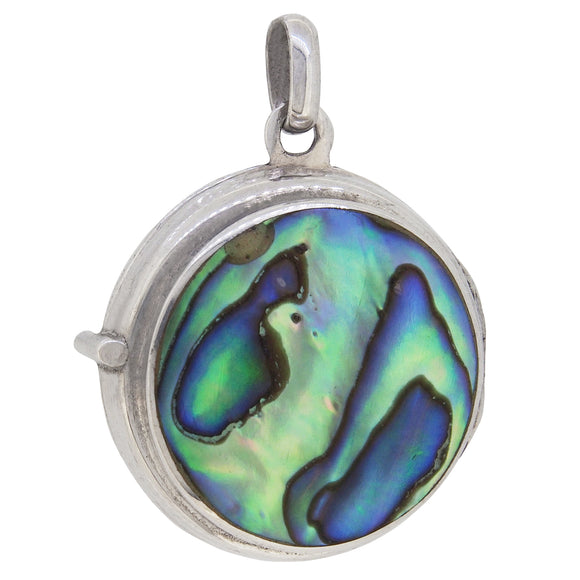 A modern, silver, abalone set circular locket