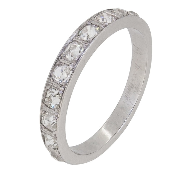 An early 20th century, platinum, swiss cut diamond set, ten stone half eternity ring