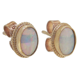 A pair of modern, 9ct yellow gold, opal set stud earrings.