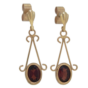 A pair of modern, 9ct yellow gold, garnet set drop earrings