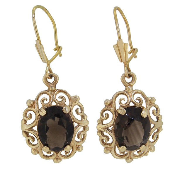 A pair of modern, 9ct yellow gold, dark citrine set drop earrings