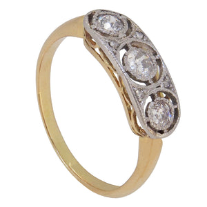 A modern, 18ct yellow gold, diamond set, seven stone, Art Deco style ring.