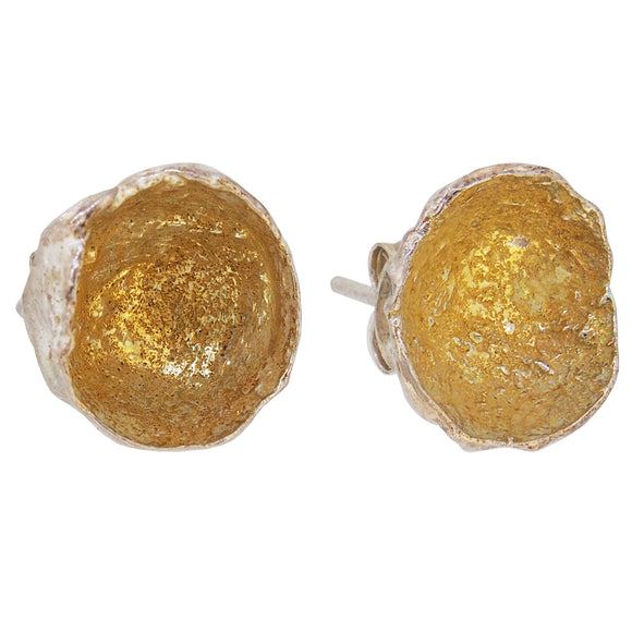 A pair of modern, silver, acorn cup stud earrings