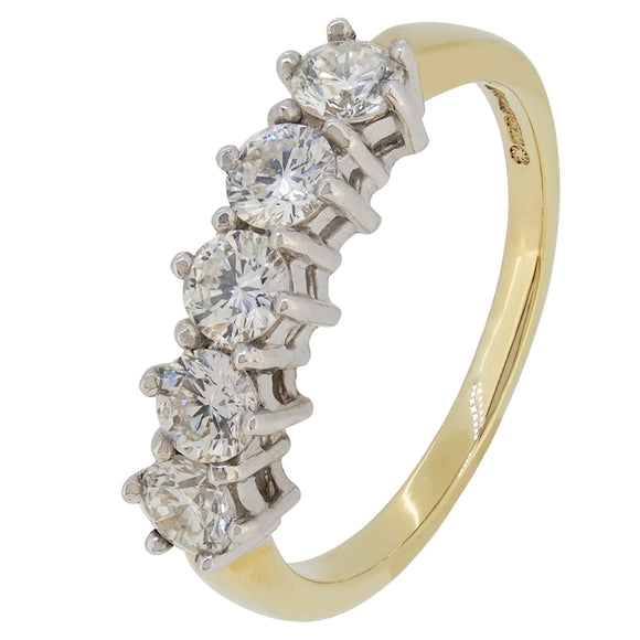 A modern, 18ct yellow gold, diamond set, five stone half hoop ring.