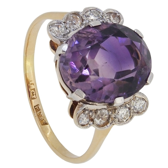 A mid-20th century, 18ct yellow gold & platinum, amethyst & diamond set ring.