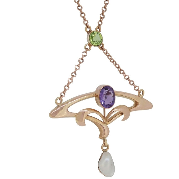 An Edwardian, 9ct rose gold, amethyst, pearl & peridot set necklace.