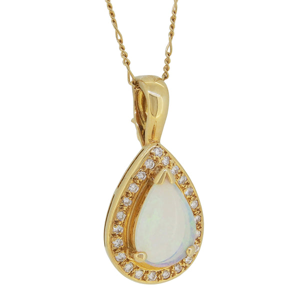 A modern, 18ct yellow gold, opal & diamond set, pear shaped pendant & chain.