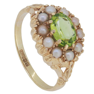 A modern, 9ct yellow gold, peridot &amp; pearl set, oval cluster ring.