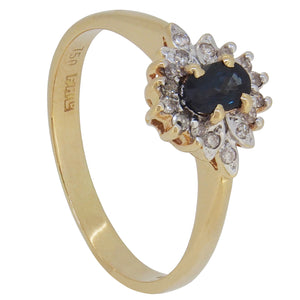 A modern, 18ct yellow gold, sapphire & diamond set, seventeen stone ring.