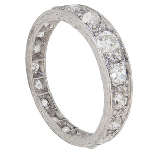 An early 20th century, platinum, diamond set eternity ring.