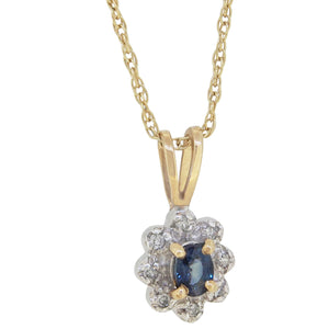 A modern, 9ct yellow & white gold, sapphire & diamond set cluster pendant & chain.