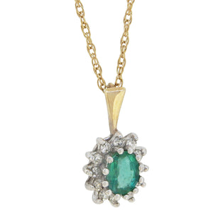 A modern, 9ct yellow gold, emerald & diamond set cluster pendant & chain.