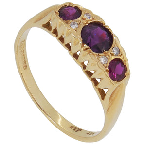 An early 20th century, 18ct yellow gold, ruby & diamond set, seven stone ring.