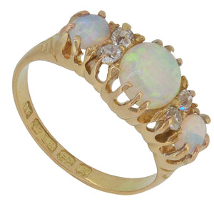 A Victorian, 18ct yellow gold, opal &amp; diamond set half hoop ring.