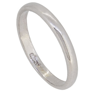 A mid-20th century, platinum, D shaped wedding ring.