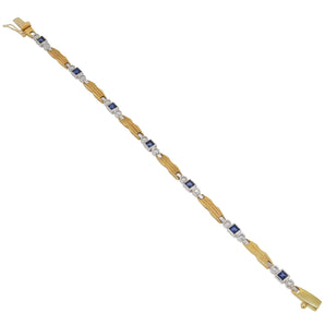A modern, 18ct yellow gold, sapphire &amp; diamond set, in line bracelet.
